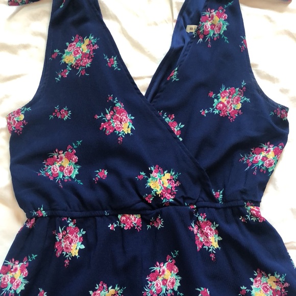 Adorable and Fun Navy/Floral Romper - Picture 3 of 4
